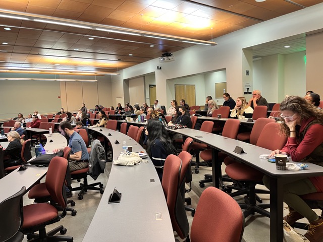 People listening to lecture